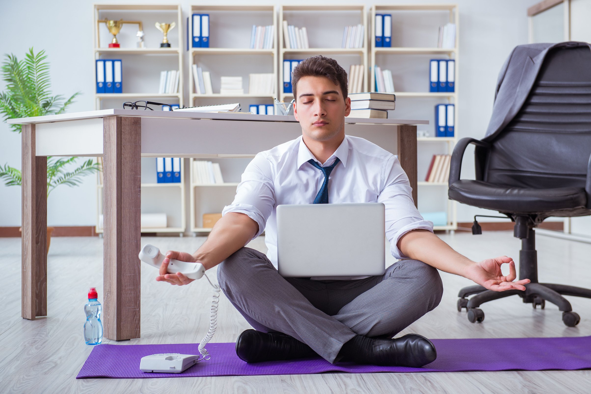 Man Meditating in the Office 